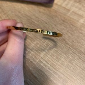Gold bracelet. Fuck fuckitty fuck.
